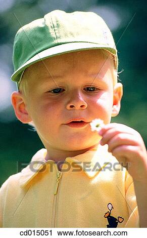 baby, cap, boy, blond, absorbed View Large Photo Image Stock Image - baby, cap, boy, blond, absorbed. Fotosearch