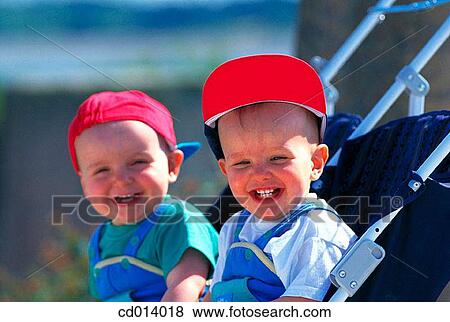 baby, cap, brother, boy, amusement View Large Photo Image Stock Photo - baby, cap, brother, boy, amusement. Fotosearch