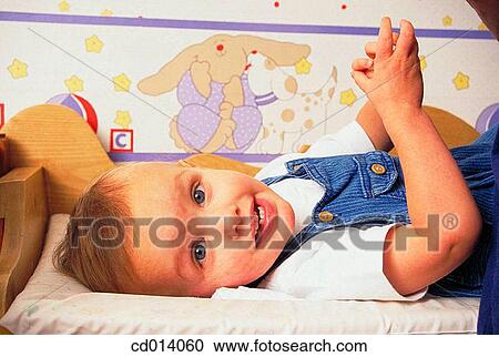Stock Image - baby, childhood, child, boy, at-home. Fotosearch