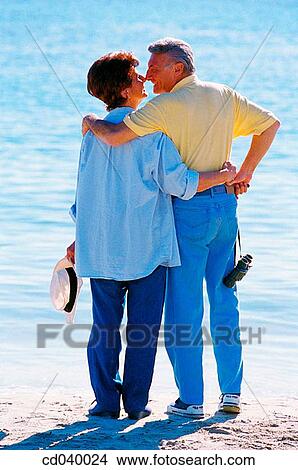 Picture - back view, beach, blue, coast. Fotosearch