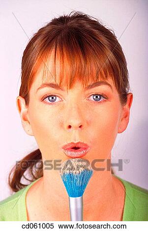Stock Photography - beauty, Beauty Care, blow, blowing, brunette. Fotosearch