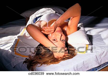 Stock Photo - bed, bedroom, at-home. Fotosearch