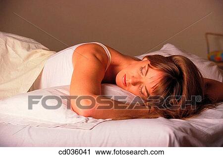 bed, brunette, bedroom, at-home View Large Photo Image Stock Image - bed, brunette, bedroom, at-home. Fotosearch