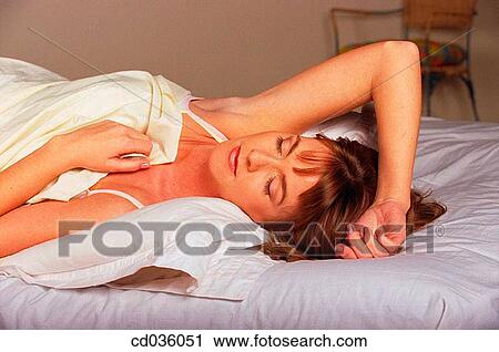 bed, brunette, bedroom, at-home View Large Photo Image Stock Image - bed, brunette, bedroom, at-home. Fotosearch
