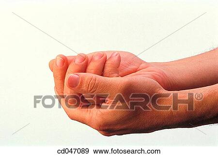 Stock Photo - beg, beggar, begging, clipping path, Close-up. Fotosearch