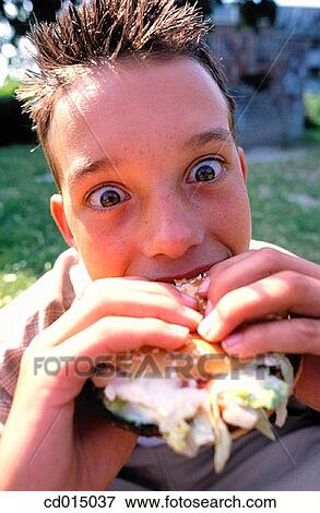 bite, biting, boy, burger View Large Photo Image Stock Photo - bite, biting, boy, burger. Fotosearch