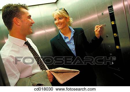 Stock Image - blond, business, businessman, businesspeople, businesswoman. Fotosearch