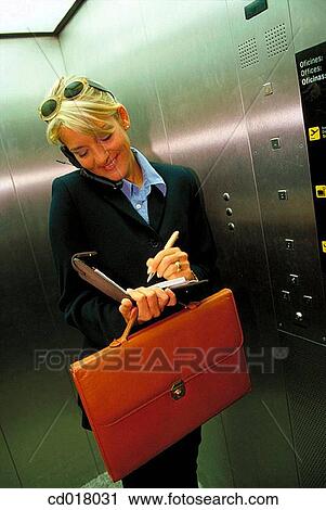 blond, businesspeople, business, briefcase, agenda View Large Photo Image Stock Image - blond, businesspeople, business, briefcase, agenda. Fotosearch