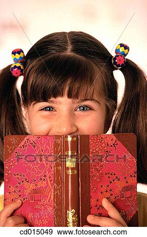 book, child, brunette, amusement View Large Photo Image Stock Photo - book, child, brunette, amusement. Fotosearch