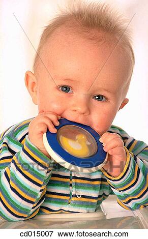 boy, baby, blond, biting, bite, at-home View Large Photo Image Stock Photo - boy, baby, blond, biting, bite, at-home. Fotosearch