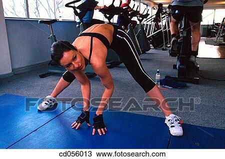 brunette, calisthenics, activity View Large Photo Image Stock Image - brunette, calisthenics, activity. Fotosearch