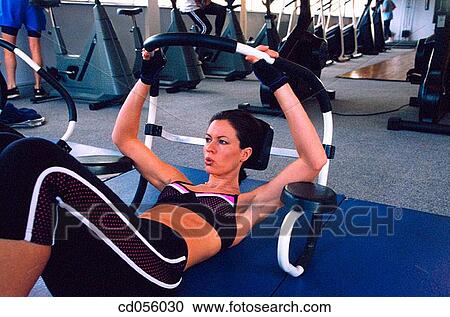 brunette, calisthenics, activity View Large Photo Image Stock Image - brunette, calisthenics, activity. Fotosearch