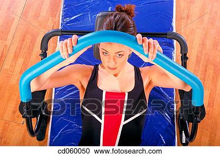 brunette, calisthenics, activity View Large Photo Image Stock Image - brunette, calisthenics, activity. Fotosearch