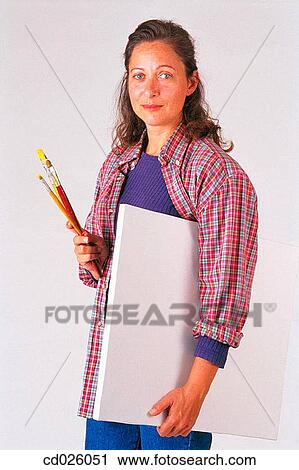 Stock Image - brunette, canvas, brush, activity. Fotosearch