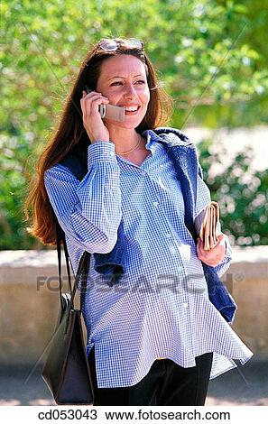 brunette, cell phone, communication View Large Photo Image Stock Image - brunette, cell phone, communication. Fotosearch