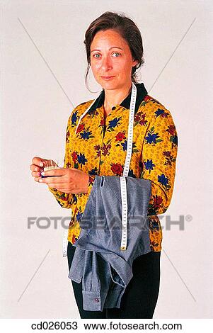 Stock Image - brunette, clothes, clipping path, activity. Fotosearch