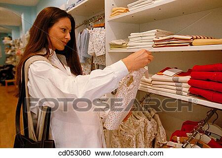 Stock Image - brunette, clothes, contemporary. Fotosearch