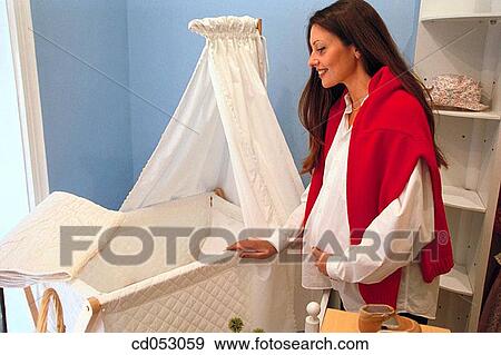 brunette, contemporary, cradle View Large Photo Image Stock Photo - brunette, contemporary, cradle. Fotosearch