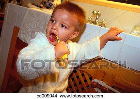 brush, at-home, boy, bathroom, bathrobe, activity View Large Photo Image Picture - brush, at-home, boy, bathroom, bathrobe, activity. Fotosearch