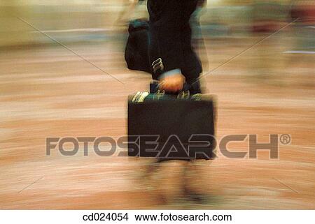 business, activity, briefcase, blurred motion, airport, action View Large Photo Image Picture - business, activity, briefcase, blurred motion, airport, action. Fotosearch