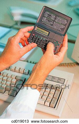 business, calculation, calculating, calculate, activity View Large Photo Image Stock Image - business, calculation, calculating, calculate, activity. Fotosearch