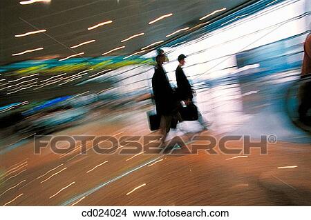 businessman, activity, business, blurred motion, airport, action View Large Photo Image Picture - businessman, activity, business, blurred motion, airport, action. Fotosearch