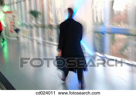 businessman, activity, business, blurred, back view, action View Large Photo Image Stock Image - businessman, activity, business, blurred, back view, action. Fotosearch