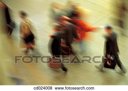 Stock Photo - businessman, activity, business, briefcase, blurred motion, action. Fotosearch