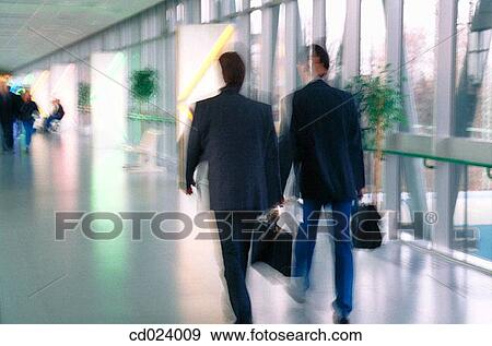 Stock Photo - businessman, activity, business, blurred, back view, action. Fotosearch