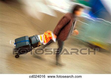 businesspeople, activity, business, blurred motion, airport, action View Large Photo Image Stock Photograph - businesspeople, activity, business, blurred motion, airport, action. Fotosearch