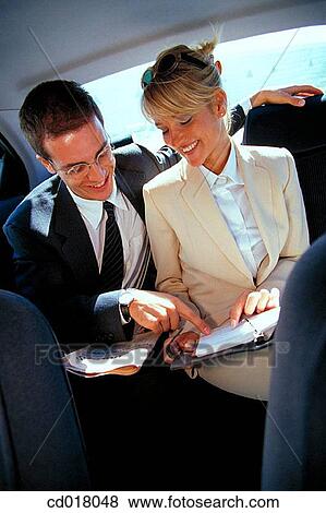businesswoman, automobile, businesspeople, businessman, business, agenda View Large Photo Image Stock Photo - businesswoman, automobile, businesspeople, businessman, business, agenda. Fotosearch