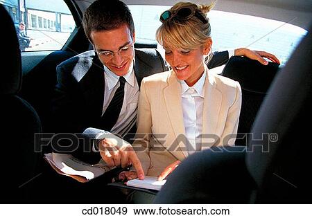 businesswoman, automobile, businesspeople, businessman, business, agenda View Large Photo Image Stock Photo - businesswoman, automobile, businesspeople, businessman, business, agenda. Fotosearch