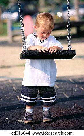 carefree, absent-mindedness, boy, balance, amusement, Absent-minded View Large Photo Image Picture - carefree, absent-mindedness, boy, balance, amusement, Absent-minded. Fotosearch