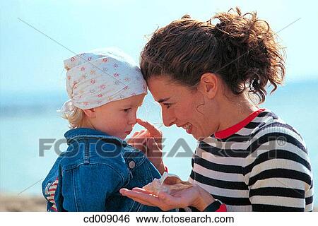 child, conch, affection View Large Photo Image Stock Photograph - child, conch, affection. Fotosearch