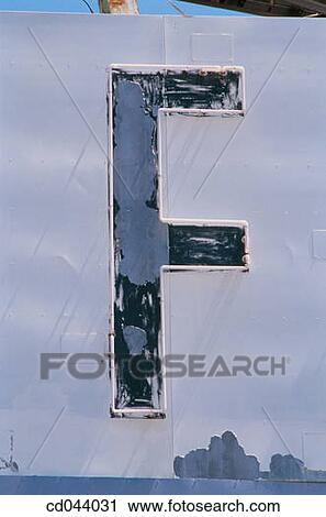 Stock Image - Close-up, alphabet, character, blue, background, aged. Fotosearch