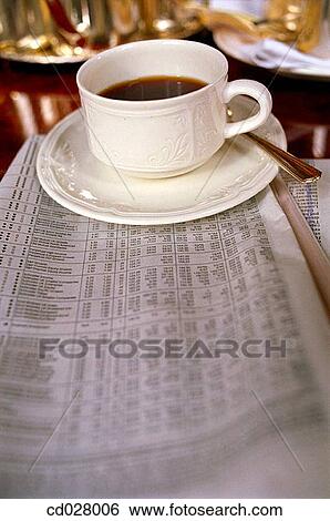 Stock Photograph - Coffee and newspaper. Fotosearch