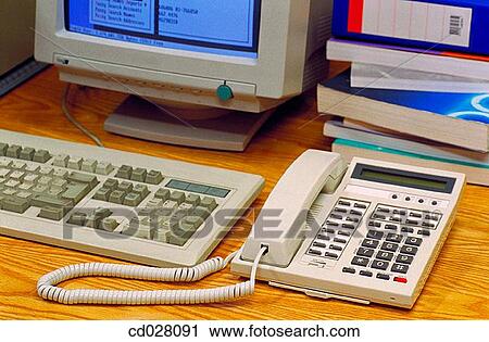 Stock Image - Computer and telephone. Fotosearch