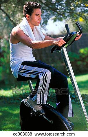 cycle, dark hair, activity View Large Photo Image Stock Photo - cycle, dark hair, activity. Fotosearch