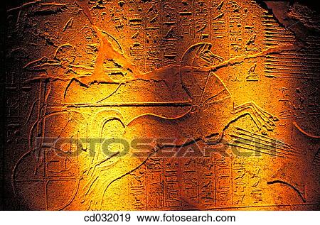 Stock Photo - Egyptian carving in stone. Luxor Museum. Luxor (ancient egyptian city of Thebes). Fotosearch