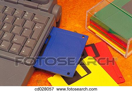 Laptop computer and floppy disks View Large Photo Image Stock Photo - Laptop computer and floppy disks. Fotosearch