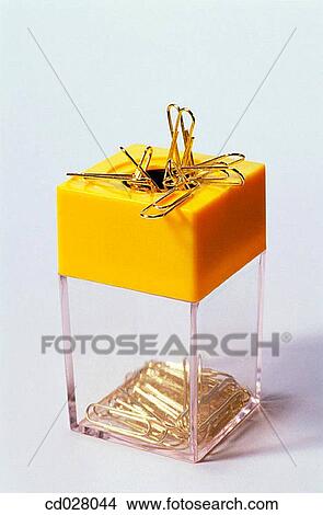 Magnetic paperclip container and paperclips View Large Photo Image Picture - Magnetic paperclip container and paperclips. Fotosearch