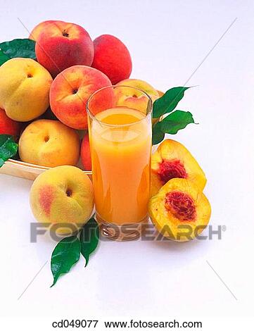 Peach juice View Large Photo Image Stock Photo - Peach juice. Fotosearch