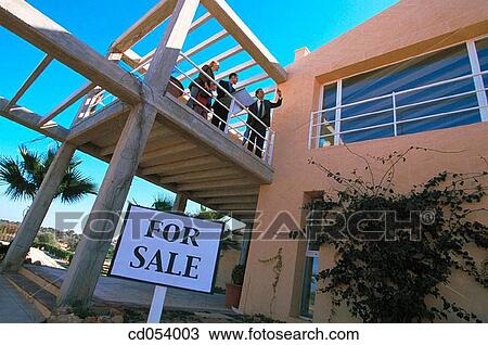 Real estate. Couple and contractor View Large Photo Image Stock Image - Real estate. Couple and contractor. Fotosearch