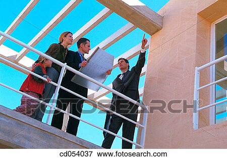Real estate. Family and contractor View Large Photo Image Stock Photo - Real estate. Family and contractor. Fotosearch