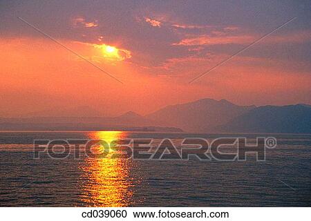 Sunset. Lake Garda. Italy View Large Photo Image Stock Image - Sunset. Lake Garda. Italy. Fotosearch