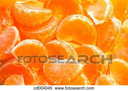 Tangerine slices View Large Photo Image Stock Photography - Tangerine slices. Fotosearch