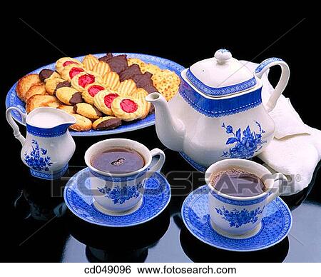 Stock Photograph - Tea and cookies. Fotosearch