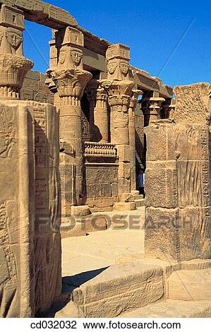 Temples of Isis. Aswan. Originally built on the island of Philae, it was removed and rebuilt on the nearby island of Agilkia in order to avoid floods View Large Photo Image Stock Image - Temples of Isis. Aswan. Originally built on the island of Philae, it was removed and rebuilt on the nearby island of Agilkia in order to avoid floods. Fotosearch