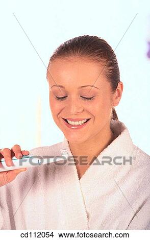 activity, Beauty Care, beauty, bathrobe, action View Large Photo Image Picture - activity, Beauty Care, beauty, bathrobe, action. Fotosearch