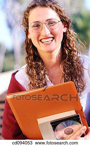 adolescence, CD, brunette, book, activity View Large Photo Image Stock Image - adolescence, CD, brunette, book, activity. Fotosearch